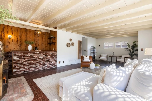 1137 Lafayette St, San Gabriel, CA 91776 - living area featuring wooden walls, brick patterned floors, and beam ceiling