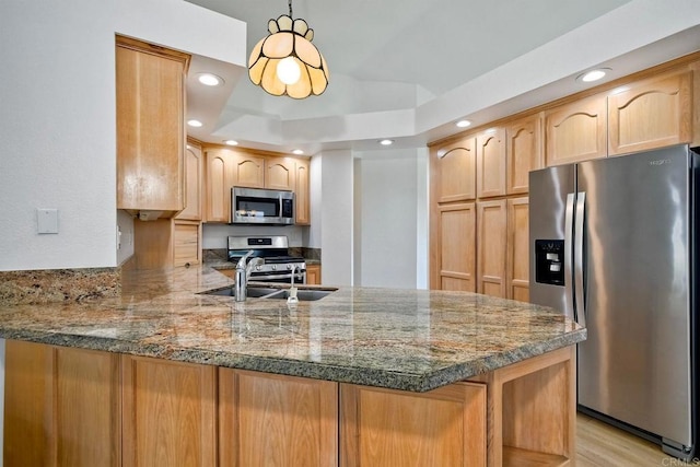 5261 Hubbert St, Oceanside, CA 92056 - kitchen with appliances with stainless steel finishes, a peninsula, recessed lighting, light brown cabinetry, and light wood-style floors