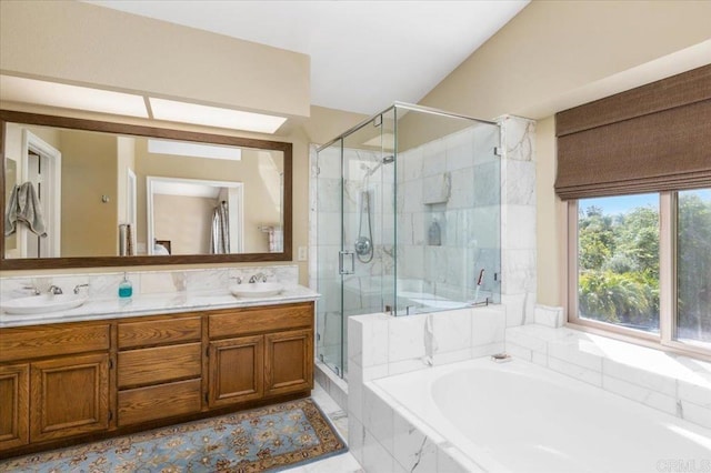 4635 Allende Ave, Oceanside, CA 92057 - bathroom featuring a stall shower, a bath, and double vanity