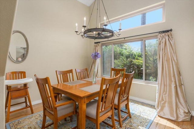 4635 Allende Ave, Oceanside, CA 92057 - dining room with a chandelier and wood finished floors