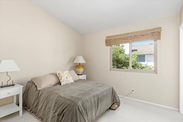 4635 Allende Ave, Oceanside, CA 92057 - carpeted bedroom featuring baseboards and lofted ceiling