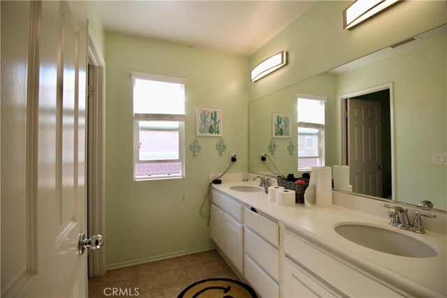 37575 Parkway Dr, Beaumont, CA 92223 - full bath featuring double vanity and tile patterned floors
