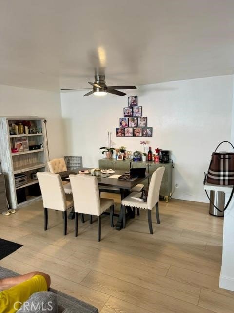 5700 Etiwanda Ave Unit 105, Tarzana, CA 91356 - dining room with a ceiling fan and light wood-style floors