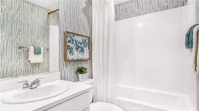 7415 Fig Grove St, Riverside, CA 92507 - bathroom featuring wallpapered walls, shower / tub combo, and vanity