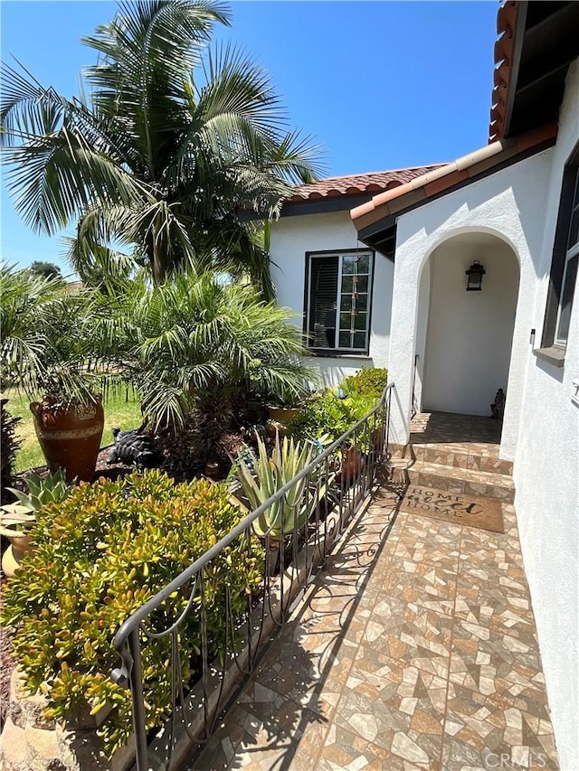 10430 San Jose Ave, South Gate, CA 90280 - property entrance with stucco siding and a tile roof