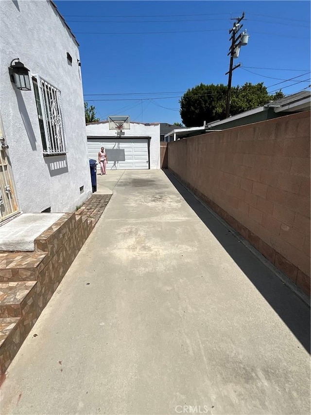 10430 San Jose Ave, South Gate, CA 90280 - view of patio / terrace featuring an outbuilding and a garage