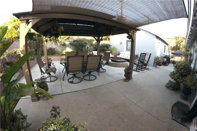 2904 Sterling St, Pomona, CA 91767 - view of patio with a gazebo, outdoor dining area, and an outdoor fire pit