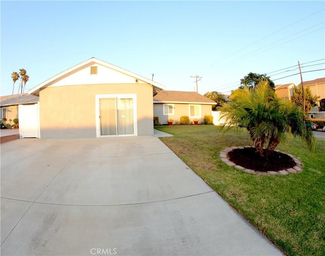 2904 Sterling St, Pomona, CA 91767 - view of front of house featuring stucco siding and a front yard
