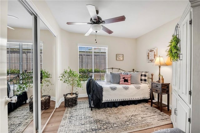 40633 Corte Albara, Murrieta, CA 92562 - bedroom with wood finished floors and ceiling fan