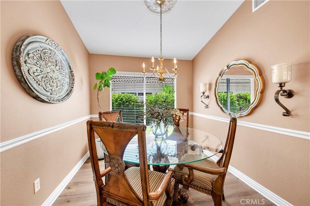 40633 Corte Albara, Murrieta, CA 92562 - dining space featuring a chandelier and light wood-style flooring
