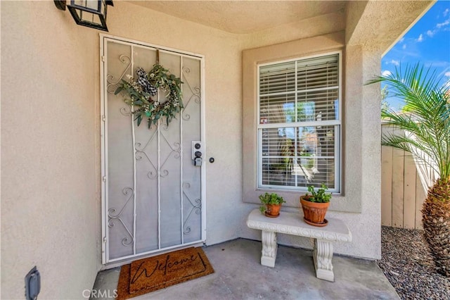40633 Corte Albara, Murrieta, CA 92562 - doorway to property with stucco siding and covered porch