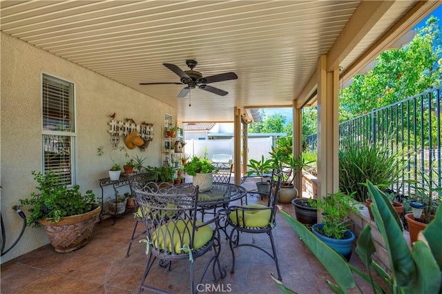 40633 Corte Albara, Murrieta, CA 92562 - fenced backyard featuring a patio area, outdoor dining space, and a ceiling fan