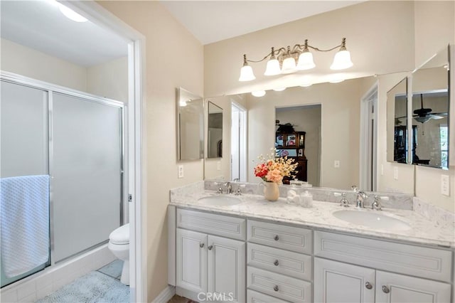 40633 Corte Albara, Murrieta, CA 92562 - bathroom featuring a stall shower, double vanity, tile patterned floors, and a closet