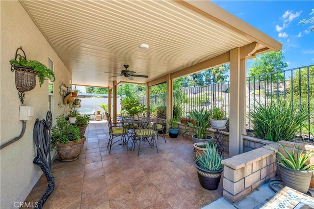 40633 Corte Albara, Murrieta, CA 92562 - fenced backyard featuring a patio, a ceiling fan, and outdoor dining space