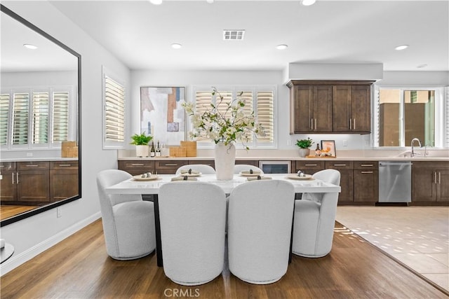 536 Cultivate, Irvine, CA 92618 - dining area featuring light wood-style flooring, recessed lighting, and beverage cooler
