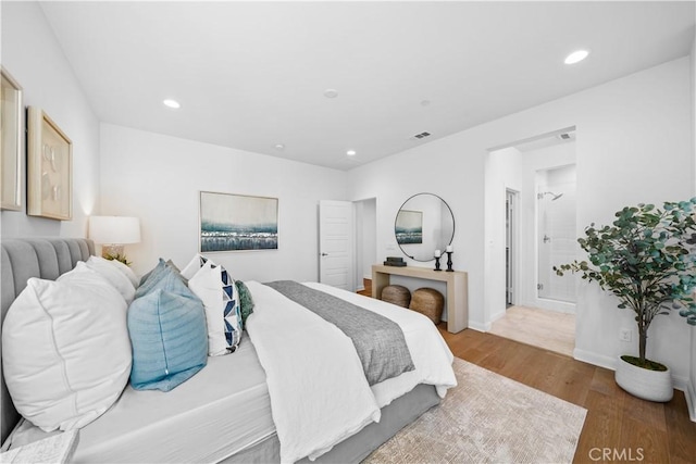 536 Cultivate, Irvine, CA 92618 - bedroom with wood finished floors and recessed lighting