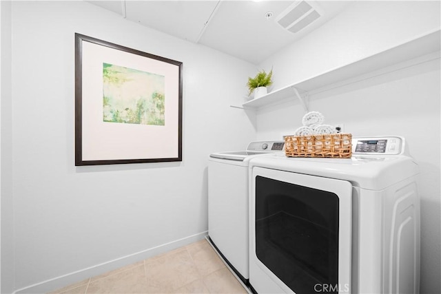 536 Cultivate, Irvine, CA 92618 - laundry room with washer and clothes dryer and light tile patterned floors