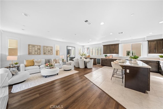 536 Cultivate, Irvine, CA 92618 - living area featuring recessed lighting, beverage cooler, and light wood-style flooring