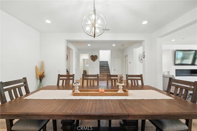 3969 Eliopulos Ranch Dr, Palmdale, CA 93551 - dining space featuring stairs, recessed lighting, and a chandelier