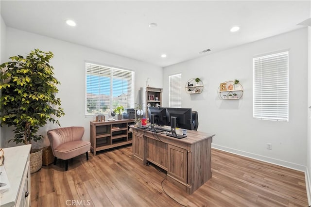 3969 Eliopulos Ranch Dr, Palmdale, CA 93551 - home office with light wood finished floors and recessed lighting