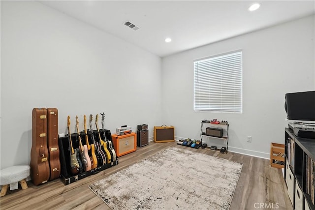 3969 Eliopulos Ranch Dr, Palmdale, CA 93551 - misc room featuring wood finished floors and recessed lighting