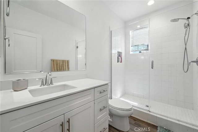 3969 Eliopulos Ranch Dr, Palmdale, CA 93551 - full bath with a shower stall, vanity, wood finished floors, and recessed lighting