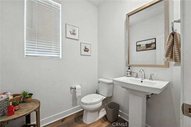 3969 Eliopulos Ranch Dr, Palmdale, CA 93551 - bathroom featuring wood finished floors and toilet