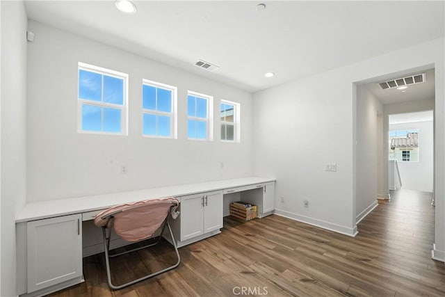 3969 Eliopulos Ranch Dr, Palmdale, CA 93551 - unfurnished office with built in desk, wood finished floors, and recessed lighting