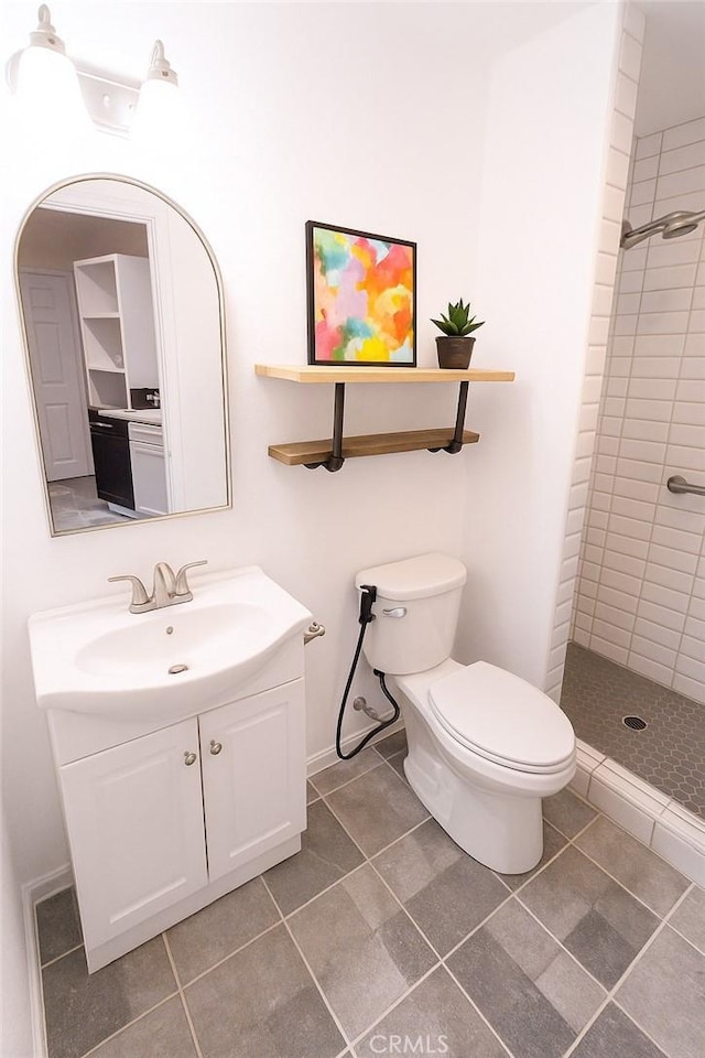 4215 Portola Ave, Los Angeles, CA 90032 - full bath with tiled shower, vanity, and tile patterned flooring