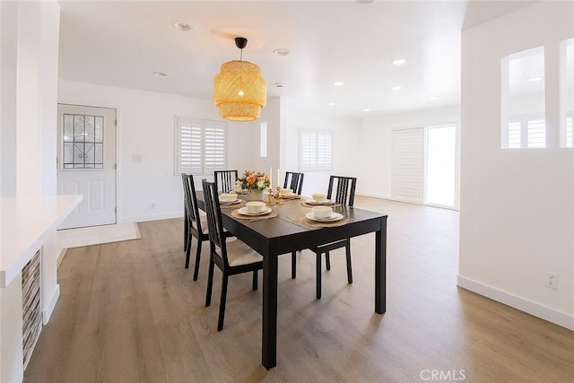 4215 Portola Ave, Los Angeles, CA 90032 - dining room with light wood-style floors and recessed lighting