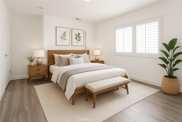 4215 Portola Ave, Los Angeles, CA 90032 - bedroom with baseboards and wood finished floors