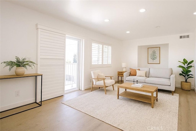 4215 Portola Ave, Los Angeles, CA 90032 - living area featuring wood finished floors and recessed lighting
