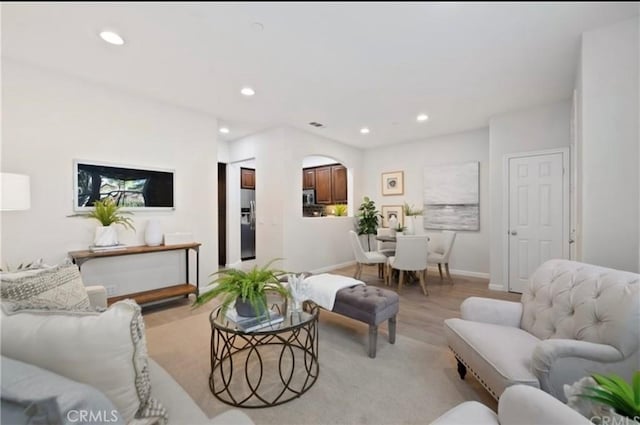 94 New Season, Irvine, CA 92602 - living room featuring recessed lighting and light wood-style floors