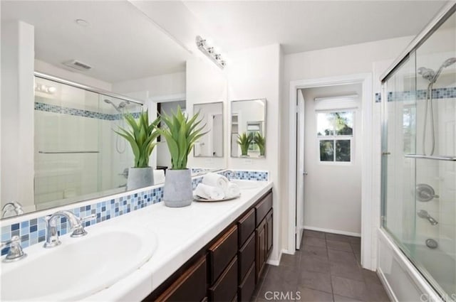 94 New Season, Irvine, CA 92602 - bathroom featuring double vanity, tile patterned floors, and combined bath / shower with glass door