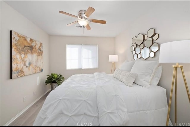 94 New Season, Irvine, CA 92602 - bedroom with wood finished floors and a ceiling fan