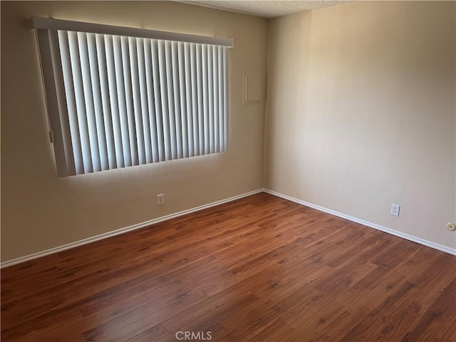 1218 Pine St, South Pasadena, CA 91030 - spare room featuring wood finished floors and baseboards