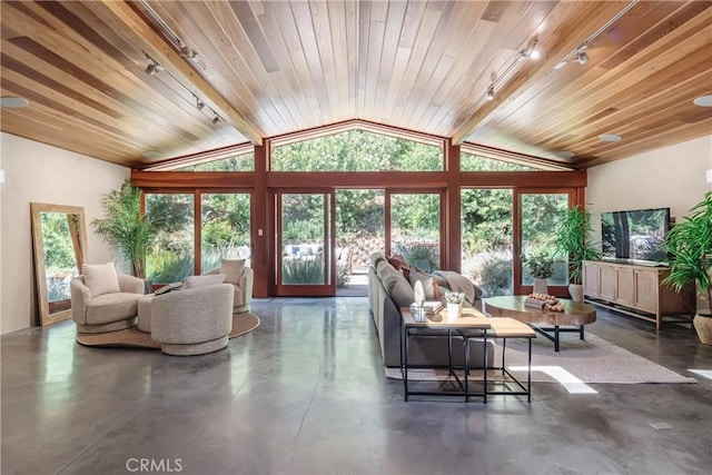 2 Chuckwagon Rd, Rolling Hills, CA 90274 - living area with rail lighting, vaulted ceiling, finished concrete flooring, and wooden ceiling