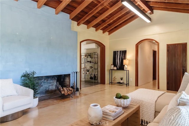 2 Chuckwagon Rd, Rolling Hills, CA 90274 - living area with arched walkways, a wall mounted air conditioner, a fireplace, wood ceiling, and concrete floors