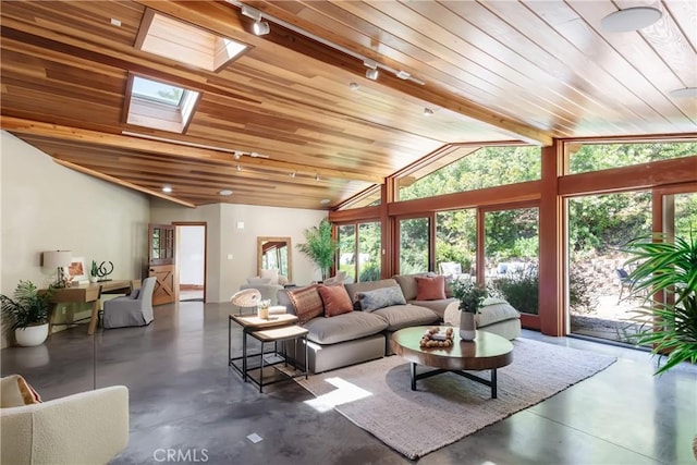 2 Chuckwagon Rd, Rolling Hills, CA 90274 - living area with concrete flooring, vaulted ceiling, wooden ceiling, a skylight, and rail lighting