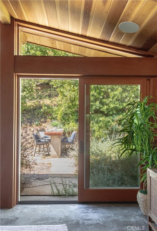 2 Chuckwagon Rd, Rolling Hills, CA 90274 - doorway with wood ceiling and concrete floors