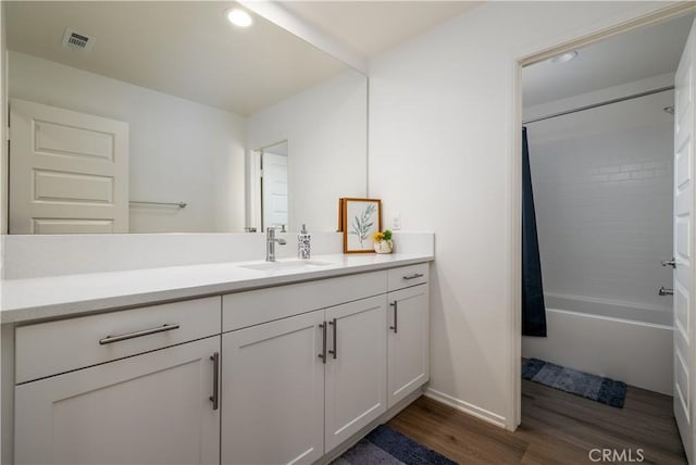 157 Ambrosia Ct, Perris, CA 92571 - bathroom featuring wood finished floors, vanity, shower / bathtub combination with curtain, and recessed lighting