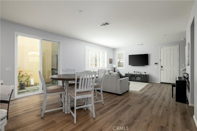 157 Ambrosia Ct, Perris, CA 92571 - dining space with wood finished floors and baseboards