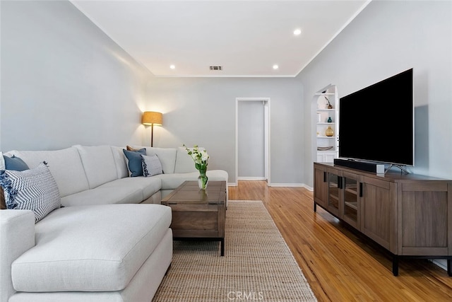 14348 Emelita St, Sherman Oaks, CA 91401 - living area featuring light wood-type flooring and recessed lighting