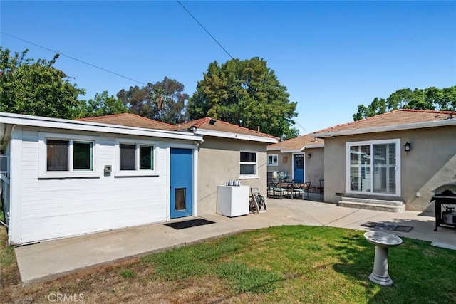 14348 Emelita St, Sherman Oaks, CA 91401 - rear view of house featuring a patio area, a yard, and stucco siding