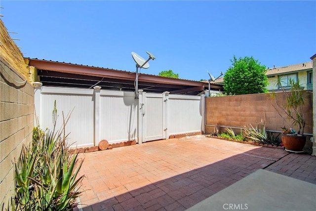 18931 Kittridge St Unit 73, Reseda, CA 91335 - view of patio / terrace featuring a gate
