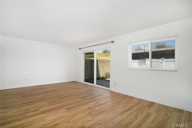 18931 Kittridge St Unit 73, Reseda, CA 91335 - empty room with light wood-type flooring and baseboards