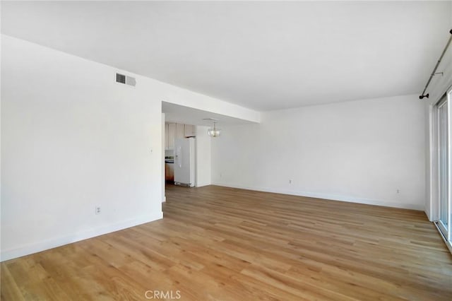 18931 Kittridge St Unit 73, Reseda, CA 91335 - spare room with light wood finished floors and baseboards