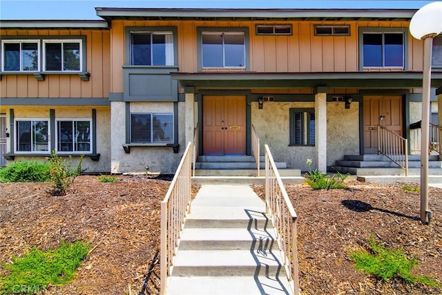 18931 Kittridge St Unit 73, Reseda, CA 91335 - view of front of property with entry steps and stucco siding