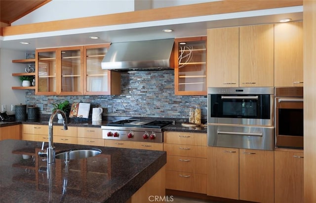 10551 Hillsboro Rd, North Tustin, CA 92705 - kitchen with wall chimney exhaust hood, a warming drawer, stainless steel appliances, tasteful backsplash, and glass insert cabinets