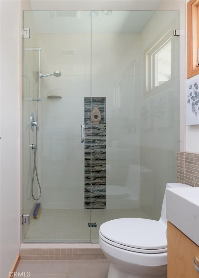 10551 Hillsboro Rd, North Tustin, CA 92705 - full bathroom featuring vanity, a shower stall, and tile patterned floors